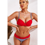 Beach Babes red and black houndstooth supportive halter bikini for women with gold hoop earrings