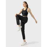 Trendsi black zip front sports bra worn by woman in active pose supportive workout bra for women