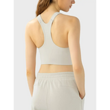 Trendsi supportive workout bra for women in light gray with racerback design