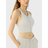 Trendsi beige zip front sports bra modeled as a supportive workout bra for women