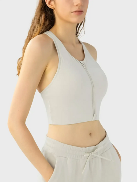 Trendsi beige zip front sports bra modeled as a supportive workout bra for women