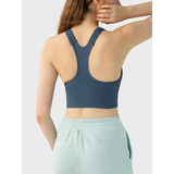 Back view of Trendsi supportive workout bra for women in dark blue with racerback design