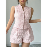 Trendsi textured resort vest and short set in light pink with sleeveless vest and high-waisted shorts