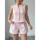 Trendsi textured resort vest and short set in light pink sleeveless vest with matching high-waisted shorts