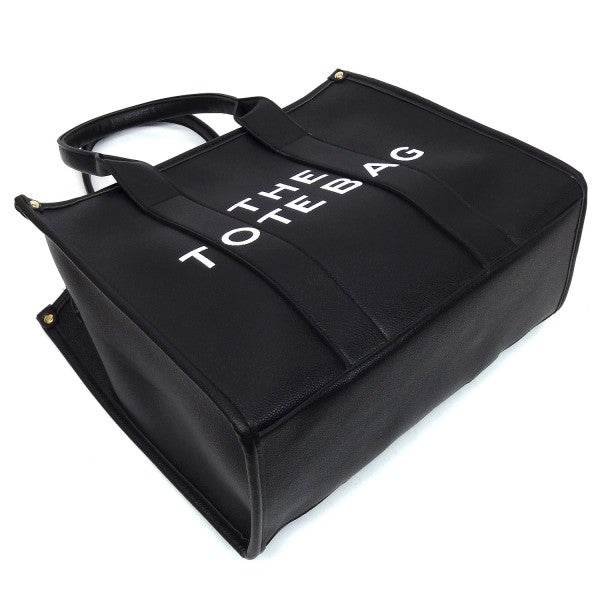 Fashion World large beach tote bag for women in black with bold white lettering and sturdy handles