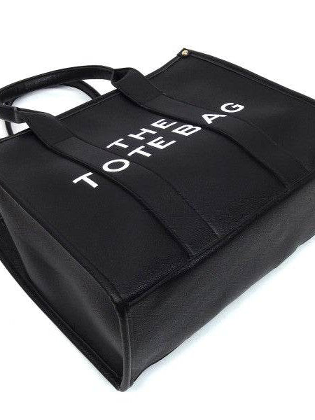 Fashion World large beach tote bag for women in black with bold white lettering and sturdy handles