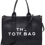 Fashion World large beach tote bag for women in black with double handles and shoulder strap