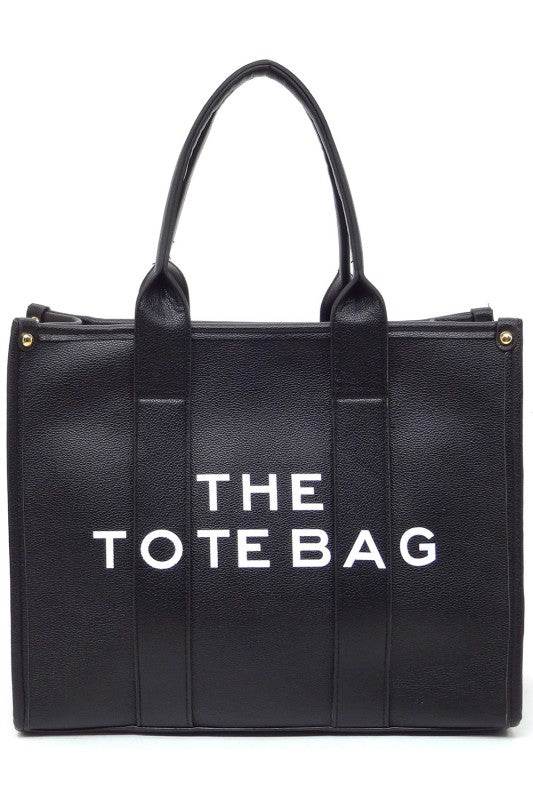 Black large beach tote bag for women with sturdy handles and spacious interior by Fashion World