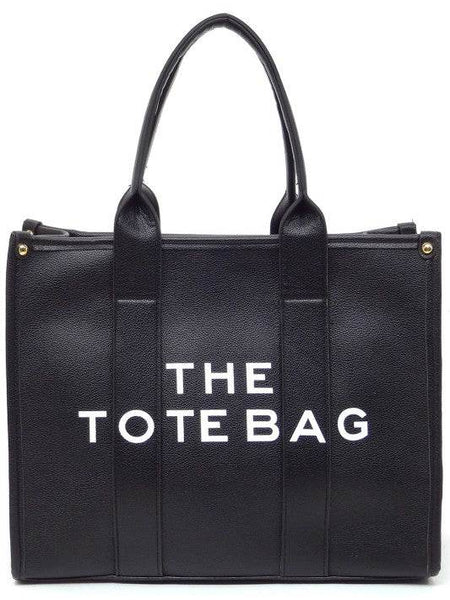 Black large beach tote bag for women with sturdy handles and spacious interior by Fashion World