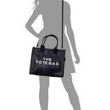 Fashion World large beach tote bag for women in black with dual handles and adjustable shoulder strap