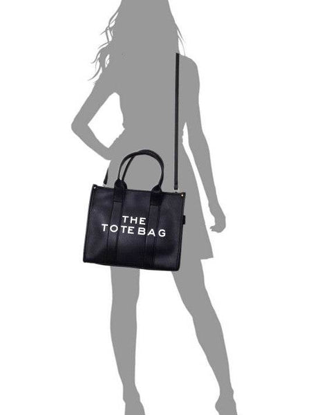Fashion World large beach tote bag for women in black with dual handles and adjustable shoulder strap