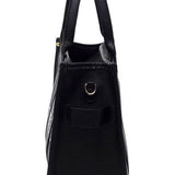 Side view of a black large beach tote bag for women with long handles and a sleek design