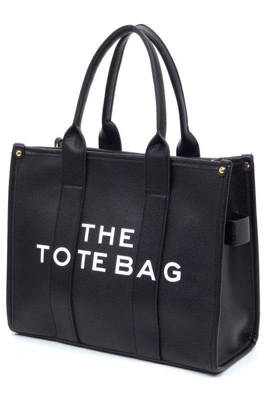 Black large beach tote bag for women by Fashion World with sturdy handles and spacious design