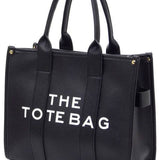 Black large beach tote bag for women by Fashion World with sturdy handles and spacious design