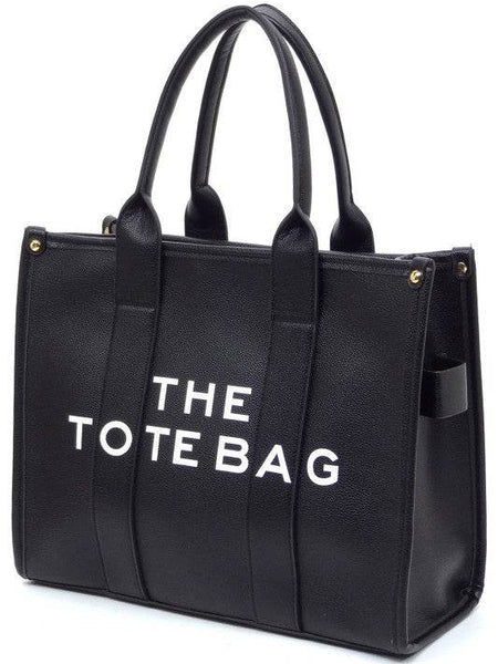 Black large beach tote bag for women by Fashion World with sturdy handles and spacious design