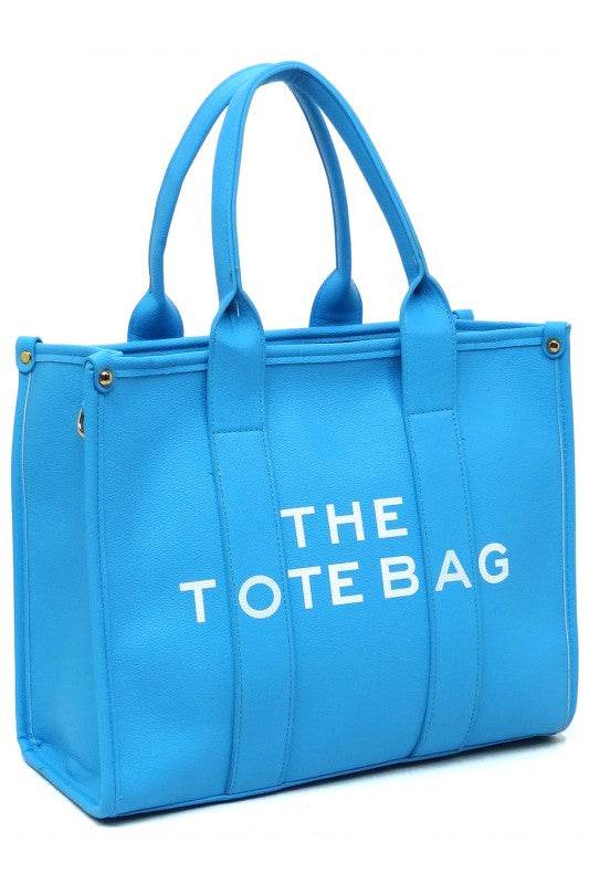 Fashion World large beach tote bag for women in vibrant blue with dual handles and spacious interior