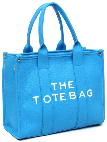 Fashion World large beach tote bag for women in vibrant blue with dual handles and spacious interior