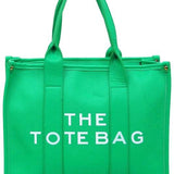 Green large beach tote bag for women by Fashion World with dual handles and spacious design