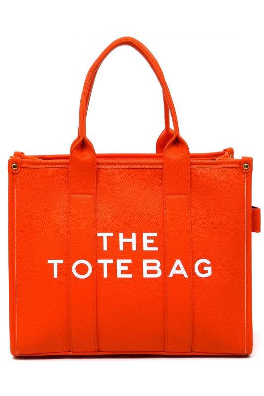 Fashion World large beach tote bag for women in bright orange with double handles and bold white text