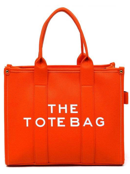 Fashion World large beach tote bag for women in bright orange with double handles and bold white text