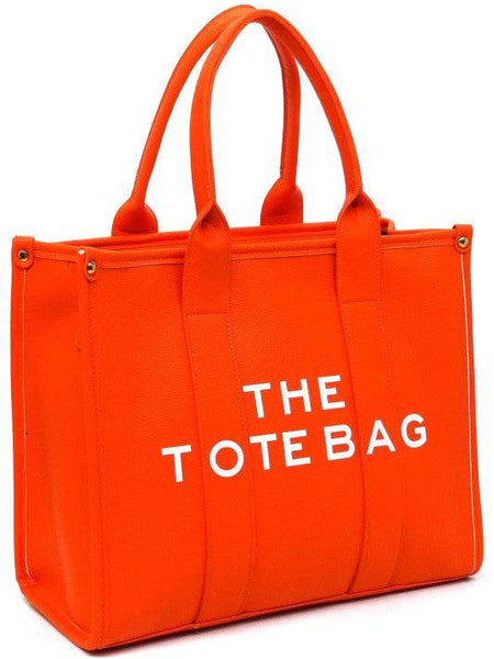 Fashion World large beach tote bag for women in bright orange with sturdy handles and bold white text