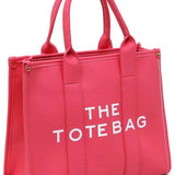 Pink large beach tote bag for women with dual handles and bold white text from Fashion World