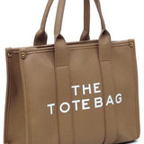 Fashion World large beach tote bag for women in brown with sturdy handles and spacious design
