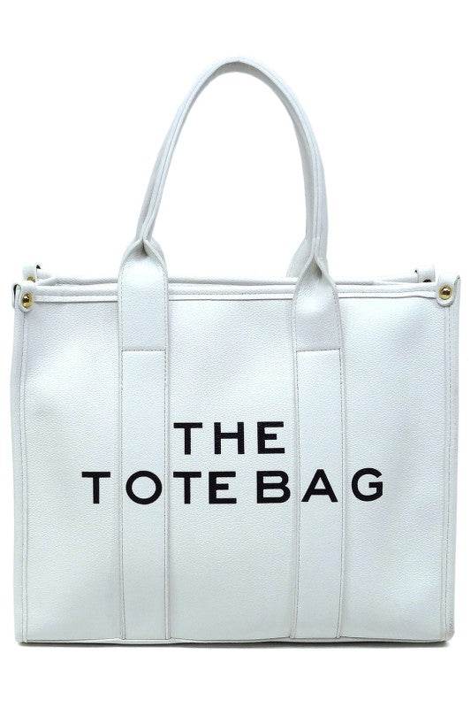White large beach tote bag for women with sturdy handles and simple design by Fashion World