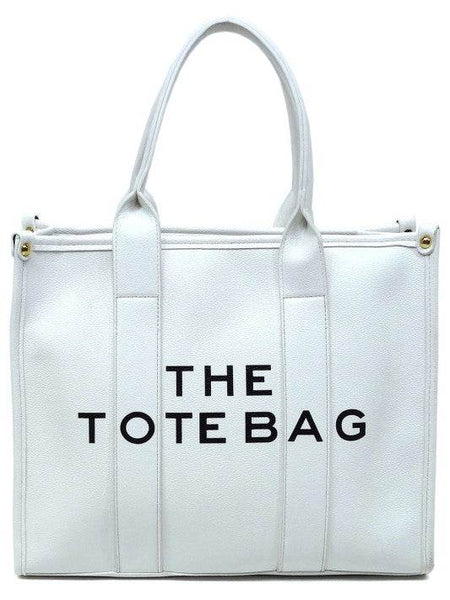 White large beach tote bag for women with sturdy handles and simple design by Fashion World