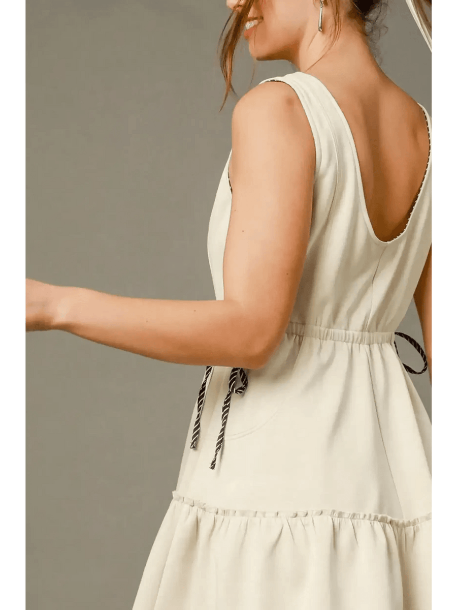 Trendsi midi dress with sleeveless design and cinched waist perfect for trendy women's beachwear under 50