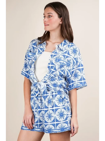 Babe Beachwear tropical blue shorts set with short sleeves and tie-front top on model
