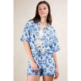 Babe Beachwear tropical blue shorts set with short sleeves and matching shorts in a geometric floral pattern