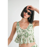 Emory Park Tropical Green Floral Tank Top with ruffle details worn by model with sunglasses