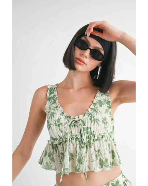 Emory Park Tropical Green Floral Tank Top with ruffle details worn by model with sunglasses