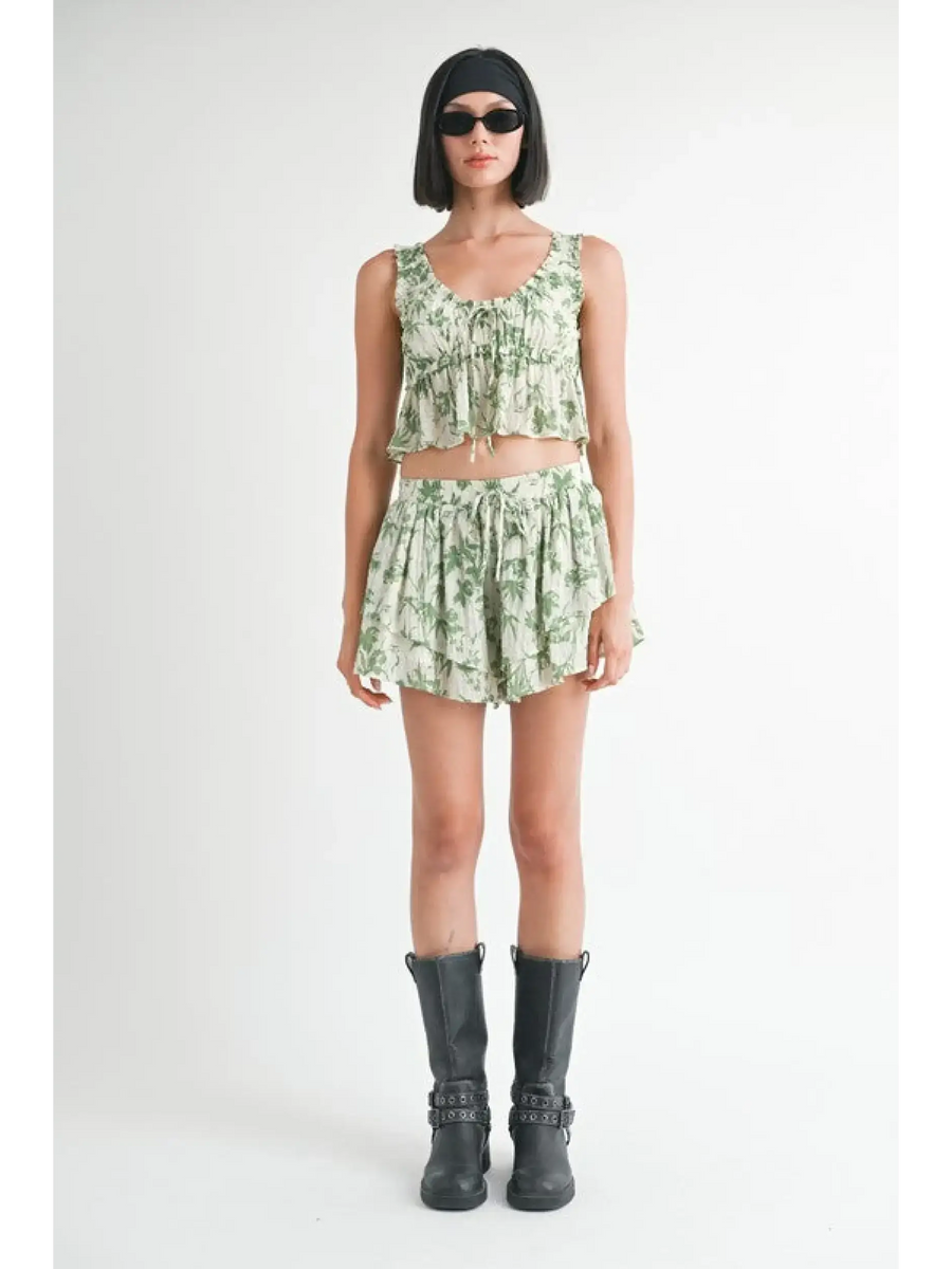 Emory Park Tropical Green Floral Tank Top paired with matching shorts worn with black boots and sunglasses