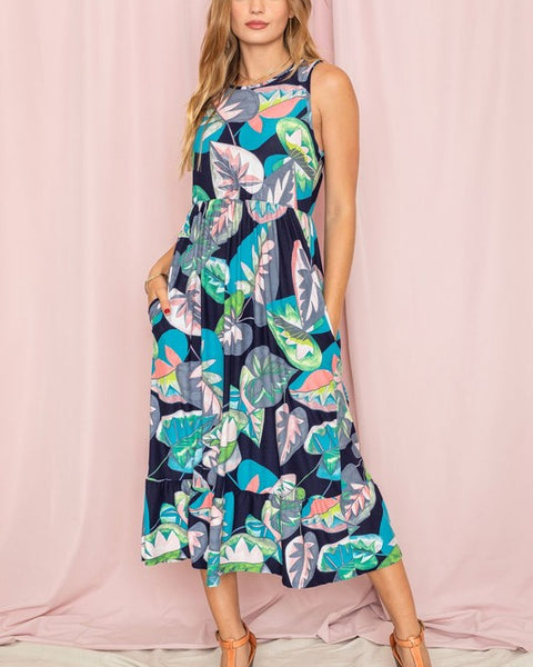 EG fashion tropical print sleeveless dress midi length with vibrant leaf pattern and pockets