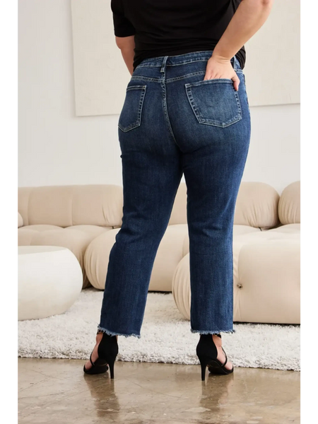 Trendsi tummy control high waist jeans in dark wash worn with black heels and black top from back view