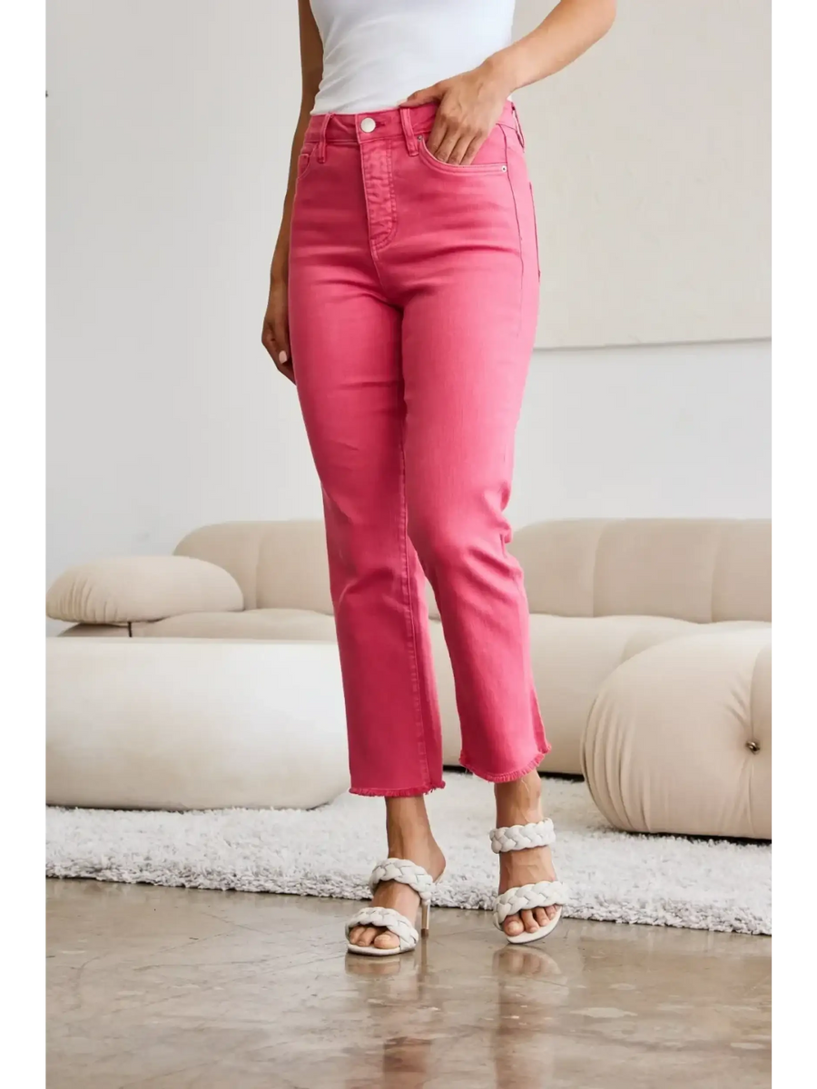 Trendsi pink tummy control high waist jeans worn with white top and sandals in modern living room