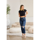 Woman wearing Trendsi tummy control high waist jeans with distressed knees and a black crop top