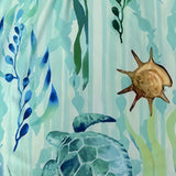 Babe Beachwear turquoise turtle beach dress featuring sea turtle and ocean plant design on mini dress fabric