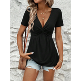 Babe Beachwaer black twisted front v-neck t-shirt for women styled with denim shorts and layered necklaces