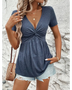 Babe Beachwear twisted front v-neck t-shirt for women in dark gray styled with distressed denim shorts