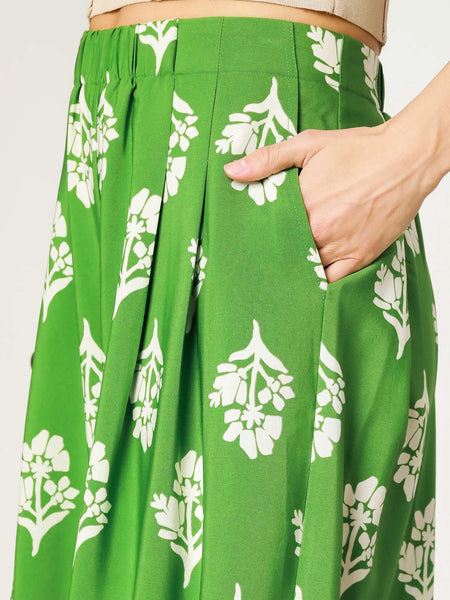 Green Umgee floral palazzo pants with white flower print and wide leg design from Trendsi