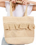 Artini Accessories uniqe ruffle straw bag in natural beige held by a woman wearing white shirt and denim shorts