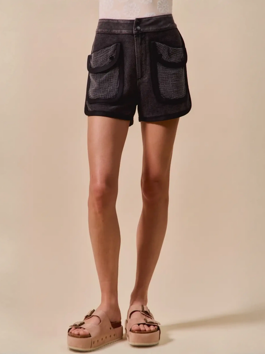 Trendsi vacation denim shorts for women in black with large front pockets and button closure