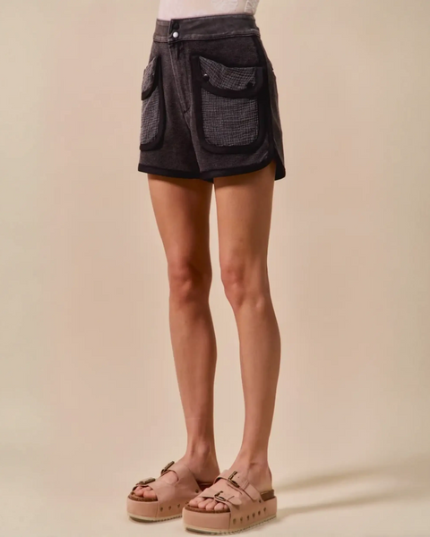 Trendsi vacation denim shorts for women in dark fabric with large front pockets styled with platform sandals