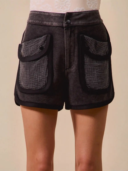 Trendsi vacation denim shorts for women in black with large textured front pockets