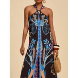 Babe Beachwear vacation halter jumpsuit outfit with vibrant blue floral print and relaxed fit