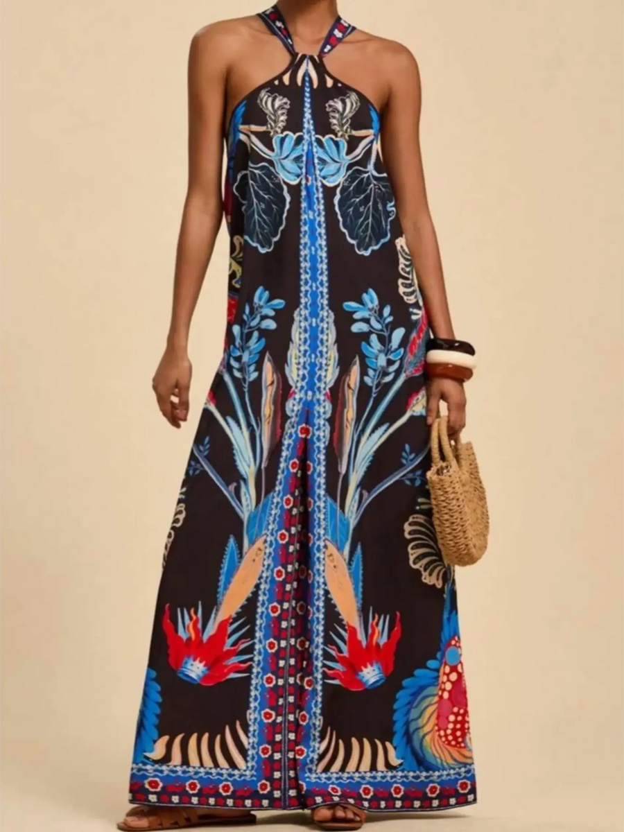 Babe Beachwear vacation halter jumpsuit outfit with vibrant floral print and wide-leg design