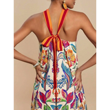 Babe Beachwear colorful floral vacation halter jumpsuit outfit with red and orange striped tie back